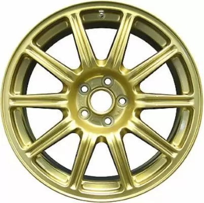 Gold alloy wheel rim on a white background