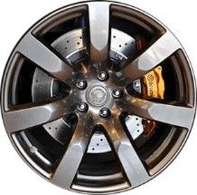 Close-up of a car wheel rim with metallic finish