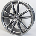 Car wheel rim with Volkswagen logo on a white background