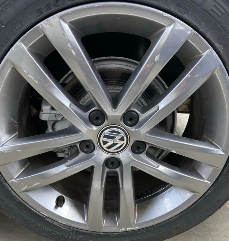 Close-up of a Volkswagen alloy wheel with visible hubcap.