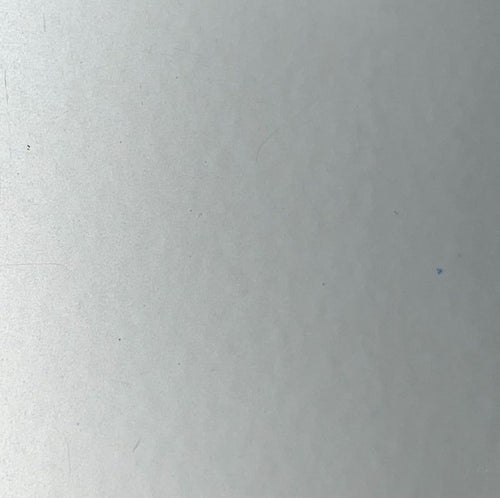 Close-up of a textured white surface