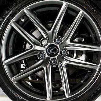 Close-up of a Lexus car wheel with a shiny rim.