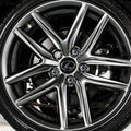 Close-up of a Lexus car wheel with a shiny rim.