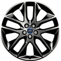 Car wheel rim with Ford logo on a white background