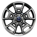 Car wheel rim with Ford logo on a white background