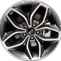 Close-up of a black alloy wheel with a visible brand logo.