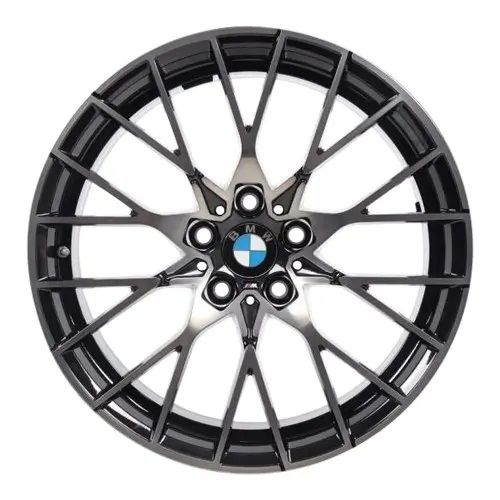 A multi-spoke alloy car wheel rim in a dark metallic gray finish, featuring the BMW logo in the center, set against a plain white background.